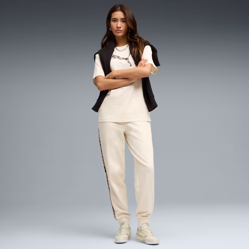 Брюки жіночі PUMA  Essentials Graphics Animal Pants Women 69246487 - Зображення